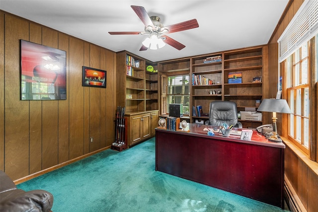 11 Carnelli Ct, Poughkeepsie, NY 12603 - carpeted home office with a baseboard radiator, wood walls, and a ceiling fan