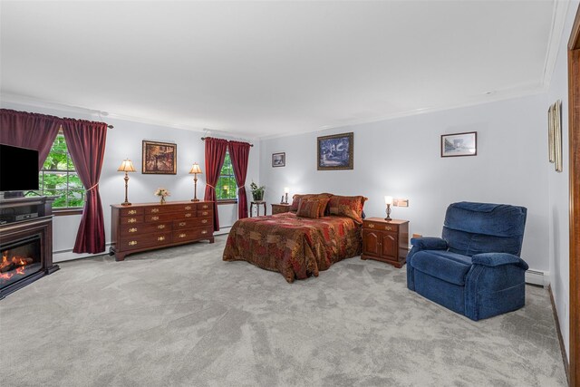 11 Carnelli Ct, Poughkeepsie, NY 12603 - bedroom featuring crown molding, carpet flooring, a baseboard radiator, and a glass covered fireplace