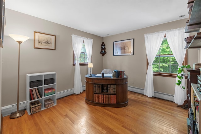 11 Carnelli Ct, Poughkeepsie, NY 12603 - office space featuring healthy amount of natural light, light wood-style flooring, a baseboard heating unit, and baseboards