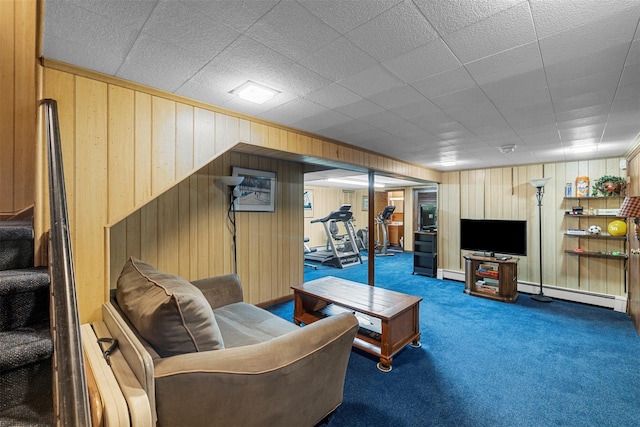 11 Carnelli Ct, Poughkeepsie, NY 12603 - living area with wood walls, carpet, a baseboard radiator, and a baseboard heating unit