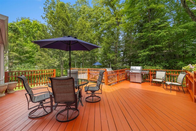 11 Carnelli Ct, Poughkeepsie, NY 12603 - wooden deck featuring outdoor dining area and a grill
