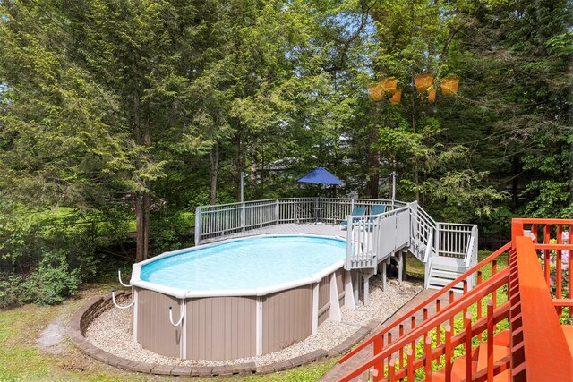 11 Carnelli Ct, Poughkeepsie, NY 12603 - outdoor pool with stairs and a deck