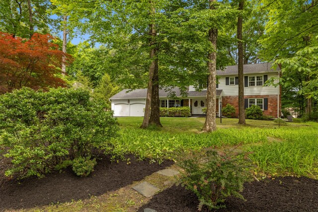 11 Carnelli Ct, Poughkeepsie, NY 12603 - view of grassy yard featuring an attached garage