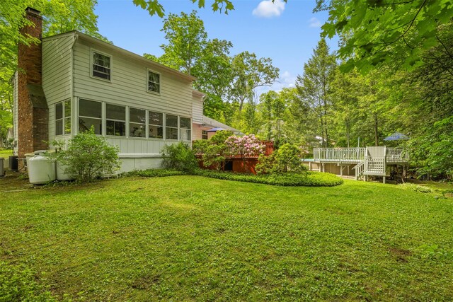 11 Carnelli Ct, Poughkeepsie, NY 12603 - view of grassy yard with a wooden deck
