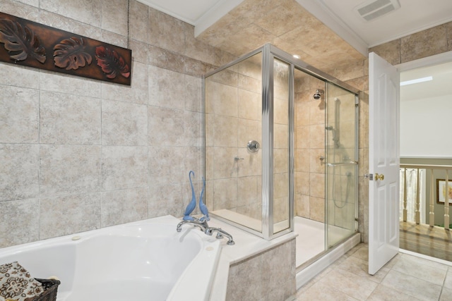 98 Beach Rd, Westhampton Beach, NY 11978 - bathroom with a stall shower, a garden tub, and tile patterned flooring