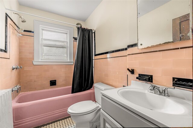 16 Rollhaus Pl, Port Chester, NY 10573 - full bath with toilet, shower / bath combo, tile walls, vanity, and wainscoting