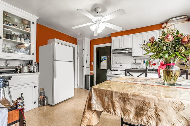16 Rollhaus Pl, Port Chester, NY 10573 - kitchen featuring white appliances, under cabinet range hood, a ceiling fan, and white cabinets