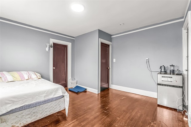 16 Rollhaus Pl, Port Chester, NY 10573 - bedroom with baseboards, hardwood / wood-style flooring, and crown molding