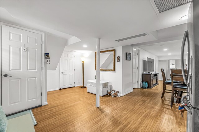 16 Rollhaus Pl, Port Chester, NY 10573 - workout room with light wood finished floors, baseboards, and recessed lighting