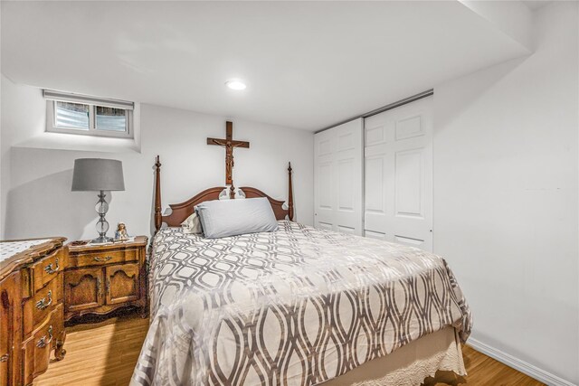 16 Rollhaus Pl, Port Chester, NY 10573 - bedroom featuring light wood-style floors, a closet, recessed lighting, and baseboards