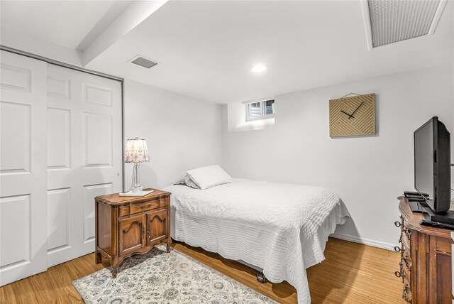 16 Rollhaus Pl, Port Chester, NY 10573 - bedroom featuring light wood-style flooring, recessed lighting, a closet, and baseboards