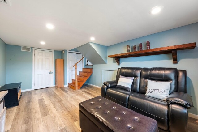 22 Willow Pl, Middletown, NY 10940 - living room with stairway, light wood-style floors, baseboards, and recessed lighting