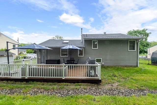 22 Willow Pl, Middletown, NY 10940 - back of property with a deck and roof with shingles