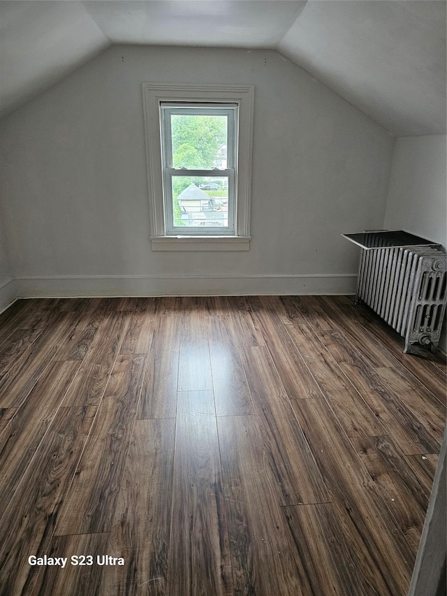 215 S 1st Ave, Mount Vernon, NY 10550 - bonus room featuring dark wood finished floors, lofted ceiling, and baseboards