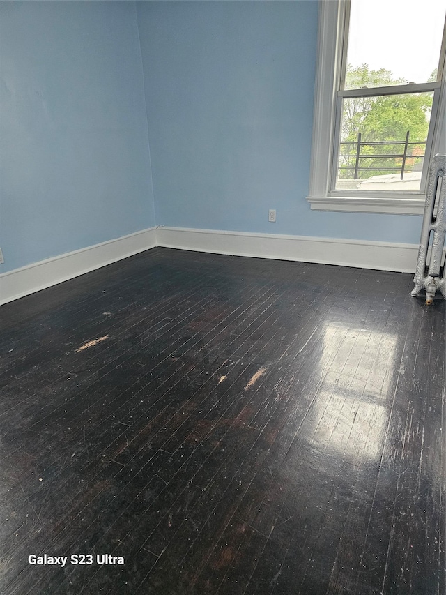 215 S 1st Ave, Mount Vernon, NY 10550 - empty room with baseboards and hardwood / wood-style floors