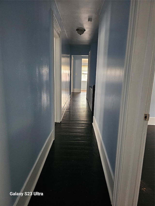 215 S 1st Ave, Mount Vernon, NY 10550 - hallway featuring baseboards and dark wood-style floors
