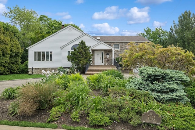 2525 Beverly Rd, Merrick, NY 11566 - view of front of home featuring stone siding