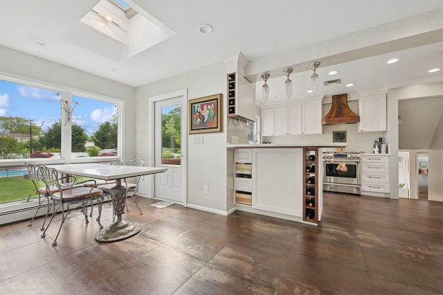 2525 Beverly Rd, Merrick, NY 11566 - dining area featuring a skylight and recessed lighting