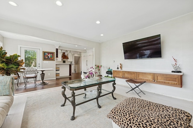 2525 Beverly Rd, Merrick, NY 11566 - living room with recessed lighting, light wood-style flooring, and baseboards