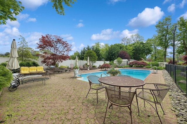 2525 Beverly Rd, Merrick, NY 11566 - view of swimming pool featuring a fenced backyard and a patio