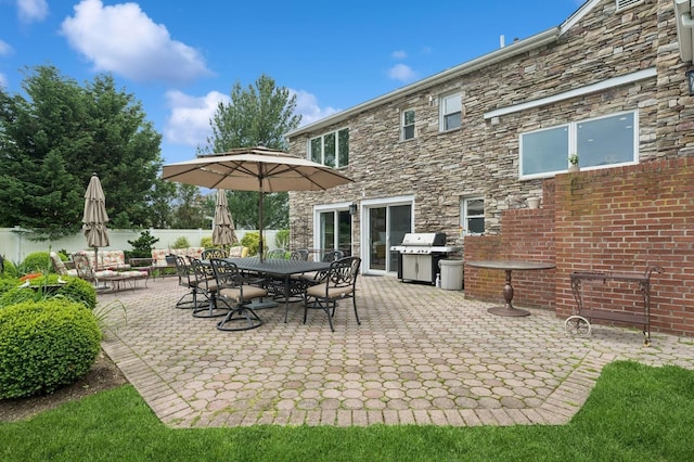 2525 Beverly Rd, Merrick, NY 11566 - view of patio / terrace with area for grilling, fence, and outdoor dining area