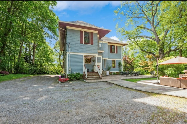 110 Red Spring Ln, Glen Cove, NY 11542 - view of front of home with a patio
