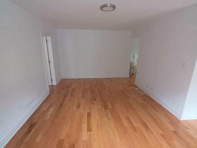 hall with light wood-style floors