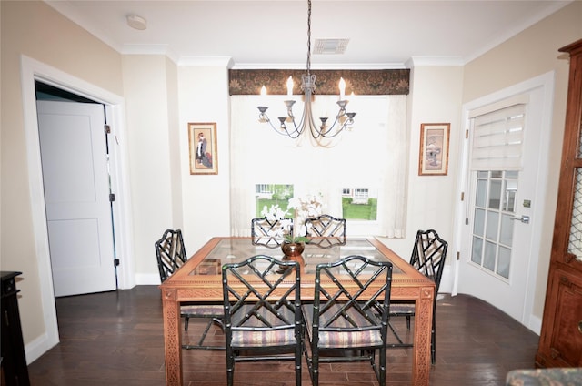 dining space featuring a chandelier, wood finished floors, ornamental molding, and baseboards