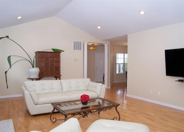 29 Madison Cir, Middle Island, NY 11953 - living area featuring ornate columns, vaulted ceiling, light wood-style flooring, recessed lighting, and baseboards