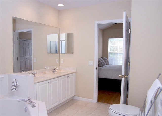 29 Madison Cir, Middle Island, NY 11953 - full bathroom featuring tile patterned flooring, a bath, ensuite bath, toilet, and double vanity