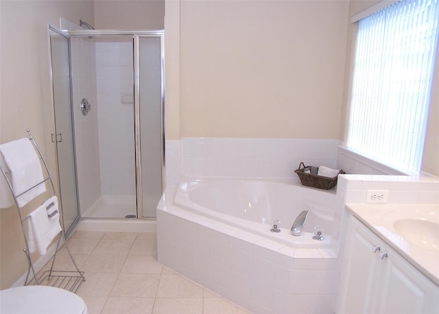 29 Madison Cir, Middle Island, NY 11953 - bathroom with a shower stall, a garden tub, vanity, and tile patterned floors