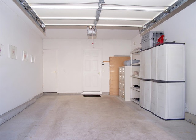 29 Madison Cir, Middle Island, NY 11953 - garage featuring a garage door opener