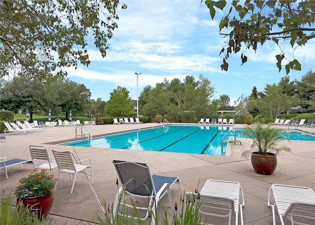 29 Madison Cir, Middle Island, NY 11953 - community pool featuring a patio