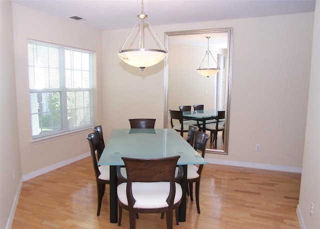 29 Madison Cir, Middle Island, NY 11953 - dining space featuring light wood finished floors and baseboards