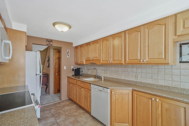 23 John St, Port Jefferson Station, NY 11776 - kitchen with dishwasher, a sink, range with electric cooktop, tasteful backsplash, and light tile patterned floors