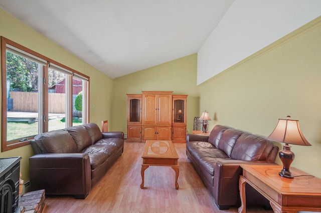 23 John St, Port Jefferson Station, NY 11776 - living area with light wood finished floors and lofted ceiling