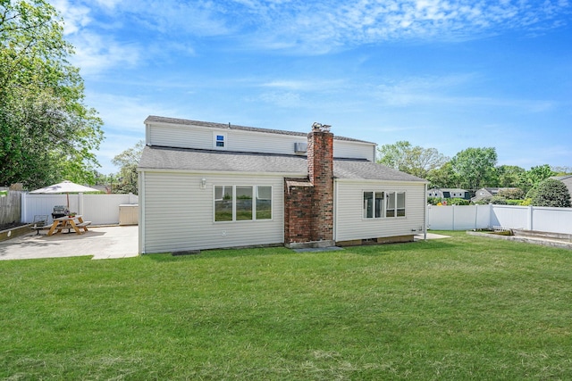 23 John St, Port Jefferson Station, NY 11776 - back of house featuring a patio area, a chimney, and roof with shingles