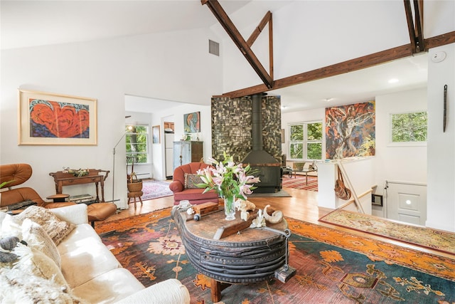 10 S Mountain Pond, Garrison, NY 10524 - living room featuring a wood stove, high vaulted ceiling, wood finished floors, and recessed lighting