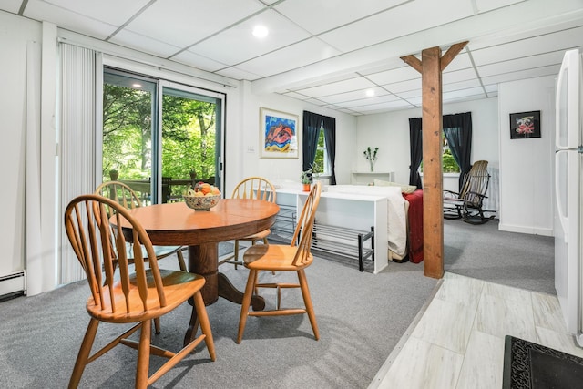 10 S Mountain Pond, Garrison, NY 10524 - dining space with light colored carpet, plenty of natural light, a paneled ceiling, and recessed lighting