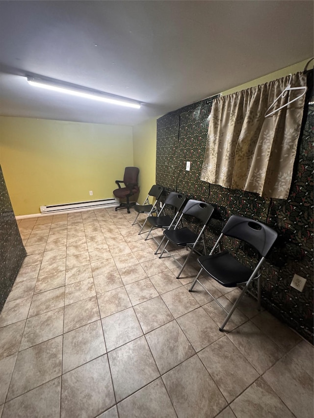 702 Tower Ct, Uniondale, NY 11553 - misc room featuring a baseboard heating unit and tile patterned floors
