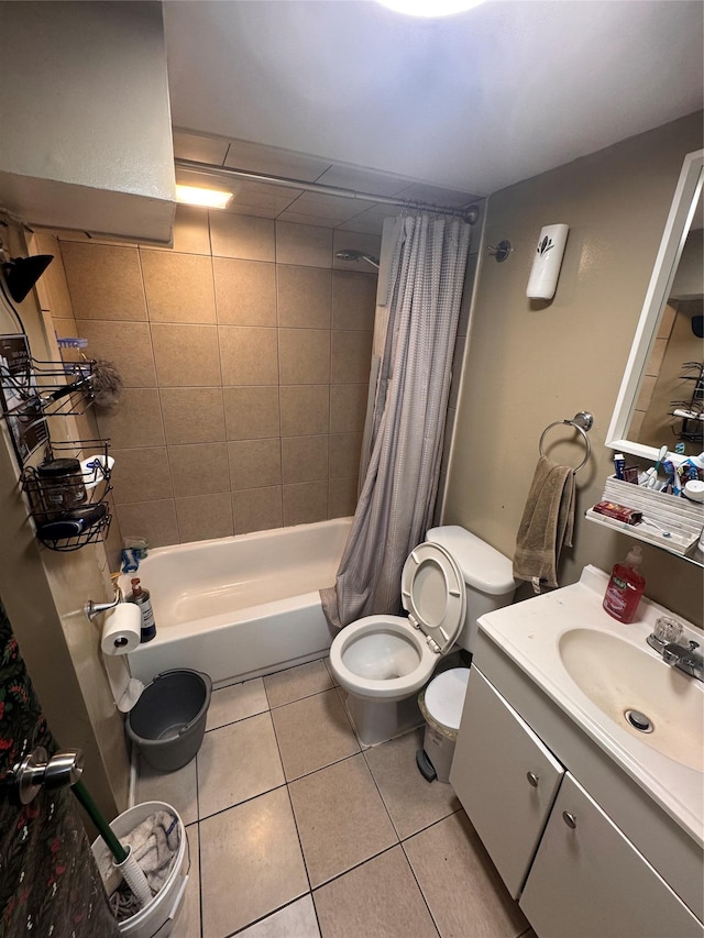 702 Tower Ct, Uniondale, NY 11553 - full bathroom featuring tile patterned flooring, toilet, shower / bath combo with shower curtain, and vanity
