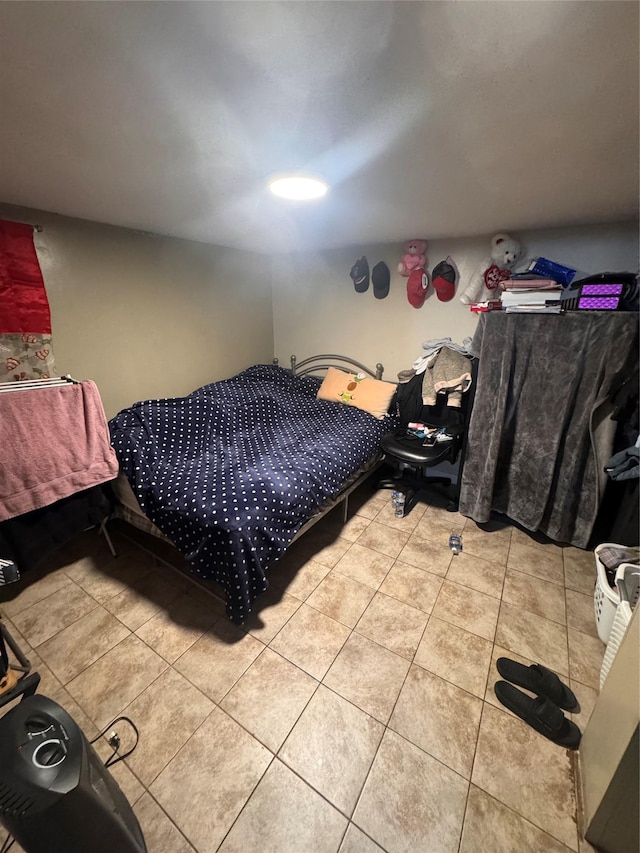 702 Tower Ct, Uniondale, NY 11553 - bedroom featuring light tile patterned floors