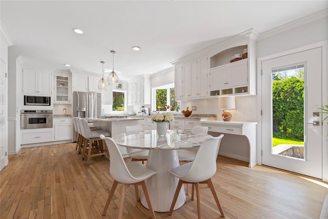 2 Robert Crisfield Pl, Rye, NY 10580 - dining area featuring ornamental molding, light wood finished floors, and recessed lighting