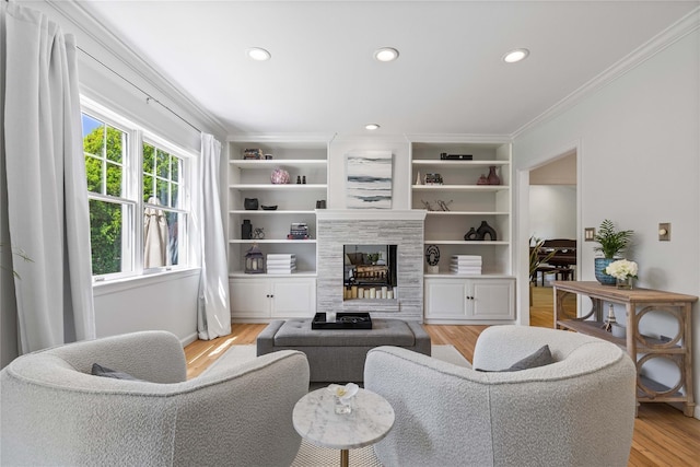 2 Robert Crisfield Pl, Rye, NY 10580 - living area with crown molding, a tiled fireplace, light wood-style floors, recessed lighting, and baseboards