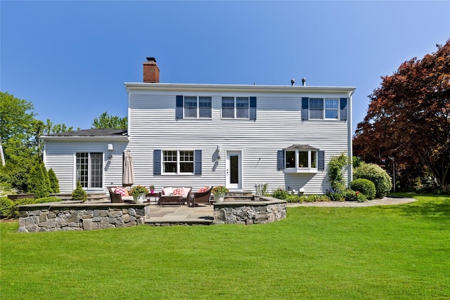 2 Robert Crisfield Pl, Rye, NY 10580 - back of house with a chimney, outdoor lounge area, a patio, and a yard