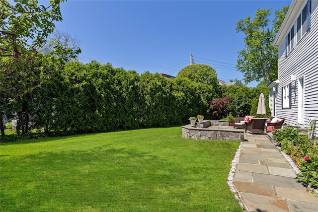 2 Robert Crisfield Pl, Rye, NY 10580 - view of green lawn featuring an outdoor living space and a patio area