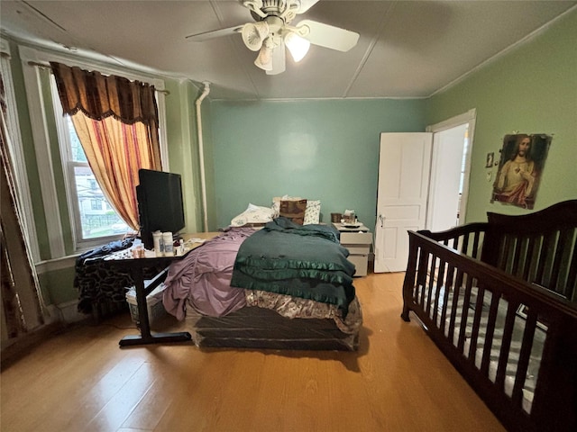 556 Van Cortlandt Park Ave, Yonkers, NY 10705 - bedroom with wood finished floors and ceiling fan