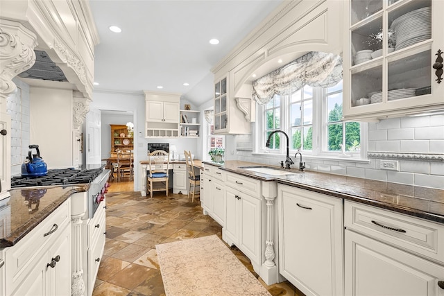 17 Byron Ln, Larchmont, NY 10538 - kitchen featuring a sink, decorative backsplash, open shelves, dark stone counters, and recessed lighting