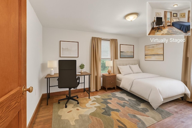 8 Townsend Blvd, Poughkeepsie, NY 12603 - bedroom featuring wood finished floors, a desk, and baseboards