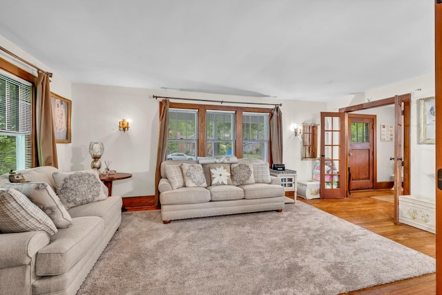 8 Townsend Blvd, Poughkeepsie, NY 12603 - living area with healthy amount of natural light, wood finished floors, and baseboards